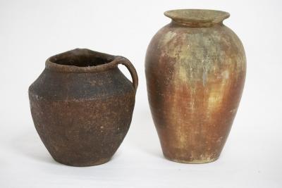 Appraisal: An earthenware ovoid jar cm high and another jar with