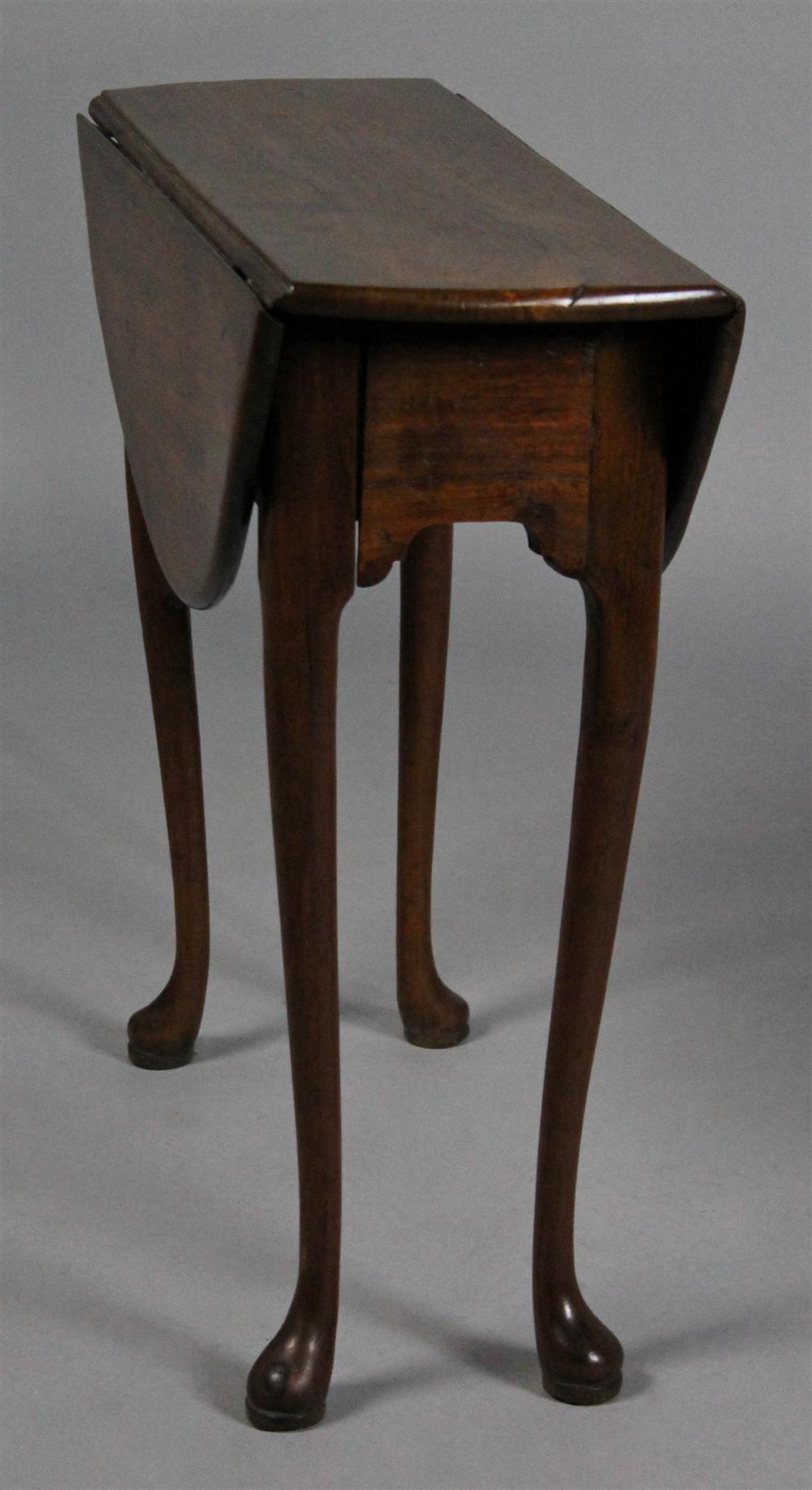 Appraisal: ENGLISH QUEEN ANNE DIMINUTIVE WALNUT DROP LEAF TABLE having a