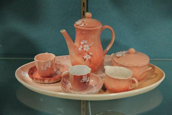 Appraisal: ROOKWOOD POTTERY TEA SET Assembled set with enameled floral design