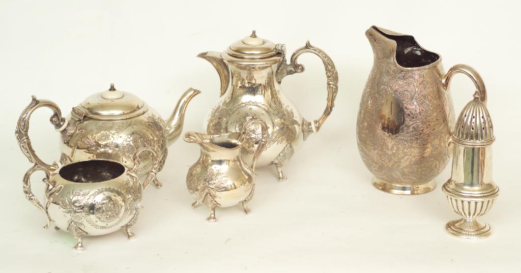 Appraisal: VICTORIAN SILVER-PLATED WATER JUG densely engraved and chased with scrolling