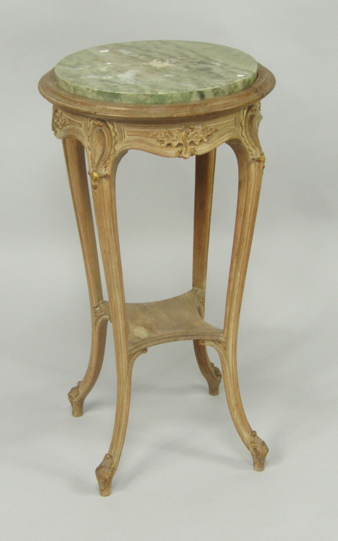 Appraisal: A thC French bleached mahogany and parcel gilt gueridon the