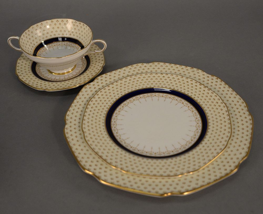 Appraisal: Paragon piece porcelain dinnerware ivory with gilt decoration and royal