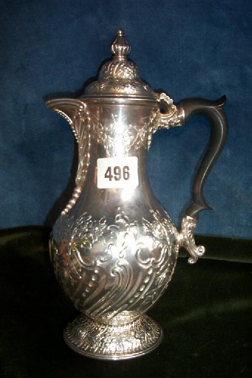 Appraisal: A Victorian silver coffee pot of baluster form on pedestal