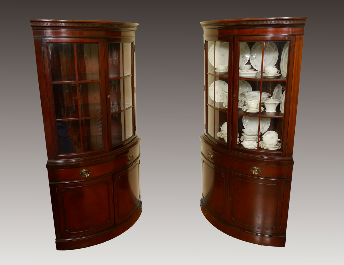 Appraisal: PAIR DREXEL TRAVIS COURT MAHOGANY CORNER CABINETS Bow front classical