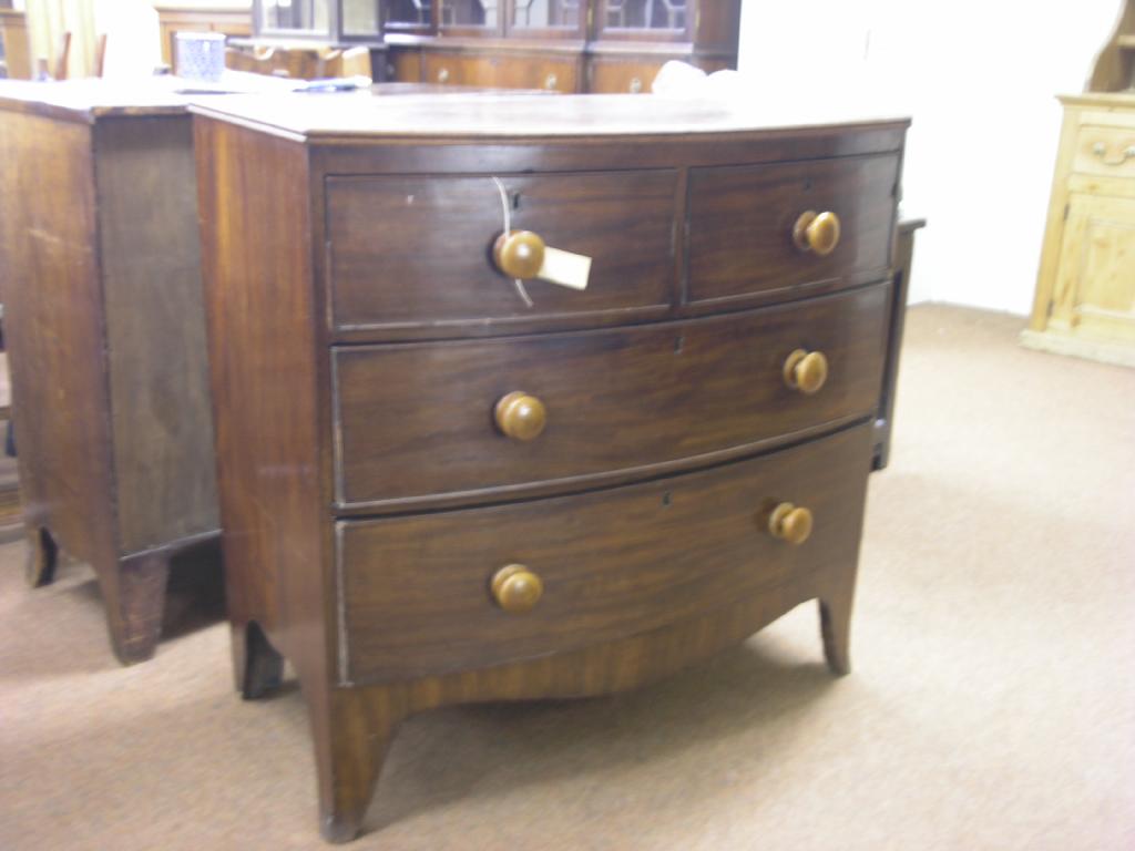 Appraisal: A Victorian mahogany bow fronted chest two short and two