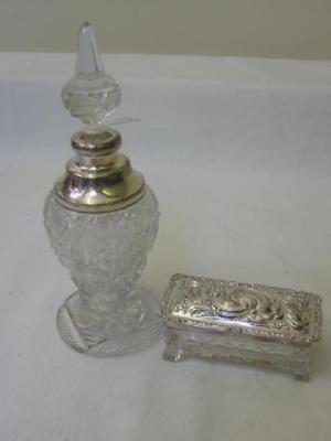 Appraisal: A CUT GLASS SCENT BOTTLE of baluster form with pointed