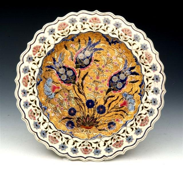 Appraisal: A ZSOLNAY ISNIK DESIGN PORCELAIN DISH with stylised flower decoration