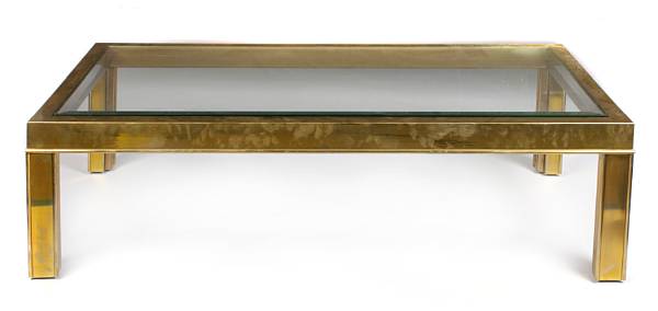 Appraisal: A brass and glass top coffee table height in width