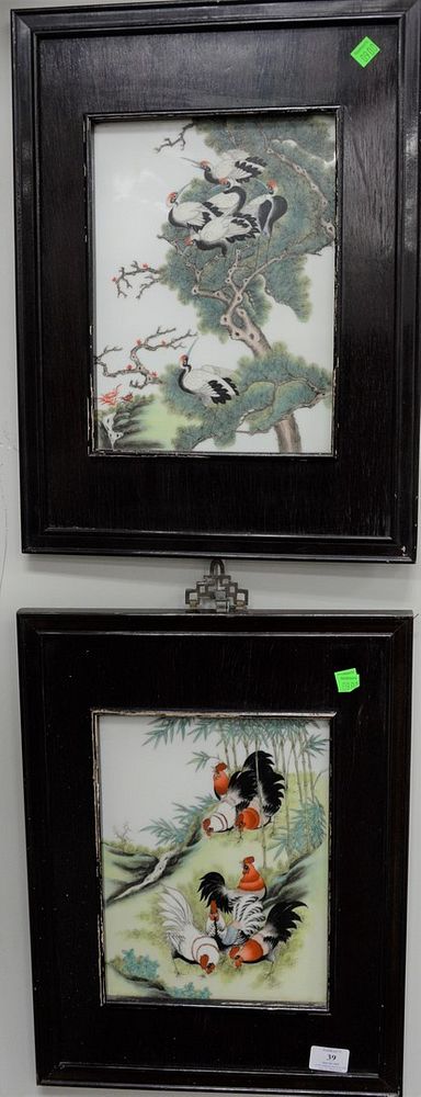 Appraisal: Two Chinese porcelain framed plaques one having painted roosters and