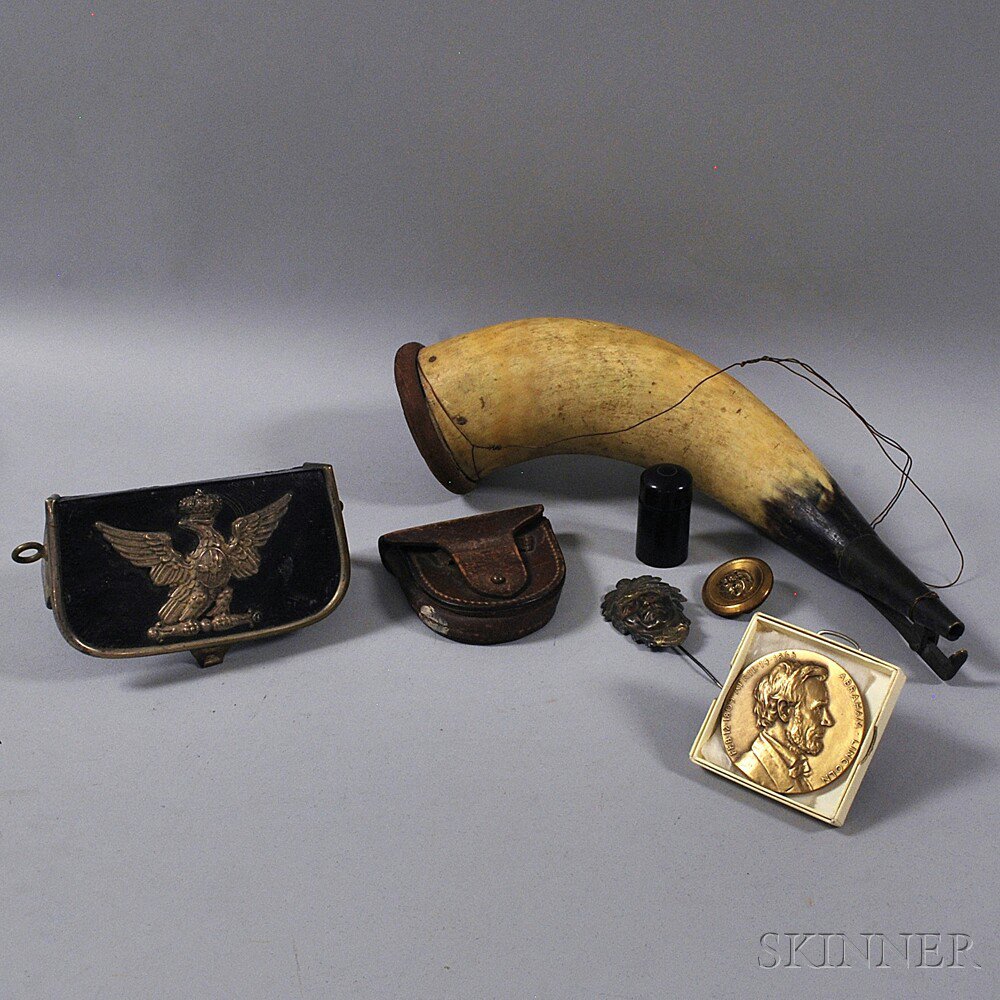 Appraisal: Seven Assorted Military Accessories a large powder horn a cartridge