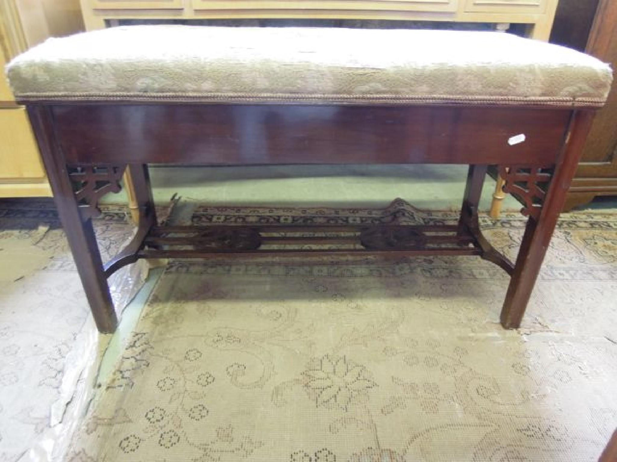 Appraisal: An Edwardian mahogany duet piano stool with upholstered box seat