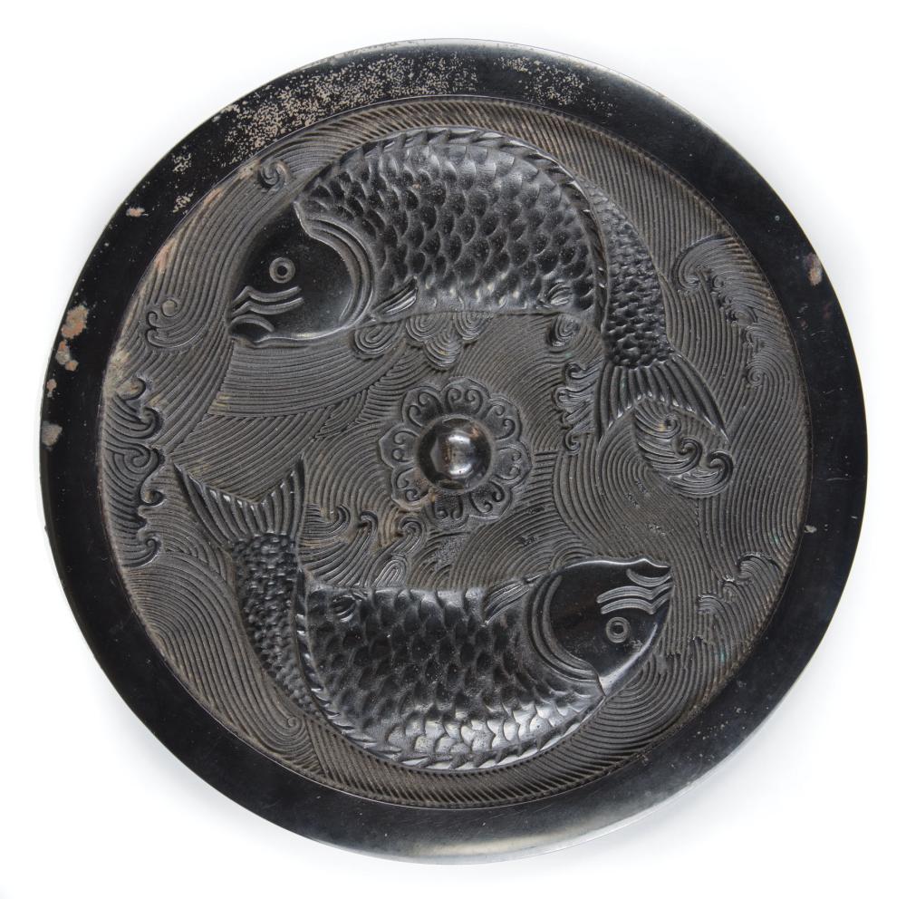 Appraisal: Chinese Bronze Mirror relief cast with twin fish encircling central