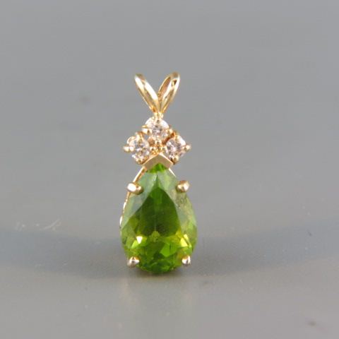 Appraisal: Peridot Diamond Pendant vivid carat pear shape gem with a