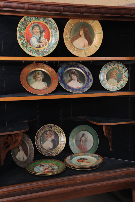 Appraisal: SEVENTEEN TIN ADVERTISING PORTRAIT PLATES Various themes and styles with