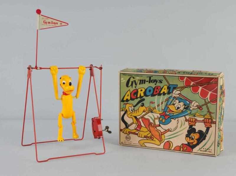 Appraisal: Celluloid Linemar Disney Pluto Acrobat Toy Description Japanese Working Larger