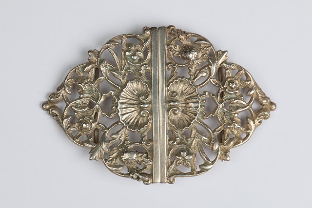 Appraisal: AN EARLY TH CENTURY SILVER BELT BUCKLE with pierced scrolling