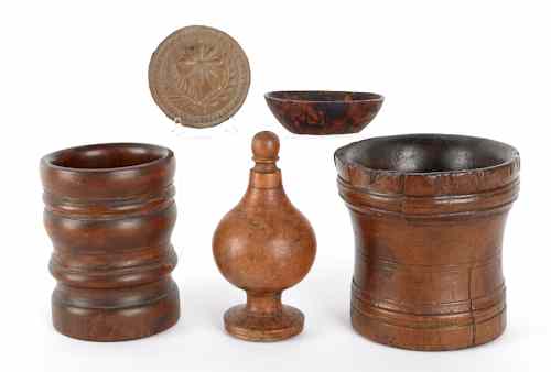 Appraisal: Woodenware to include a small burl wood bowl two mortars