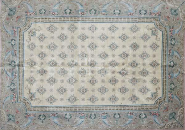 Appraisal: AUBUSSON STYLE Wool carpet in shades of cream and gray