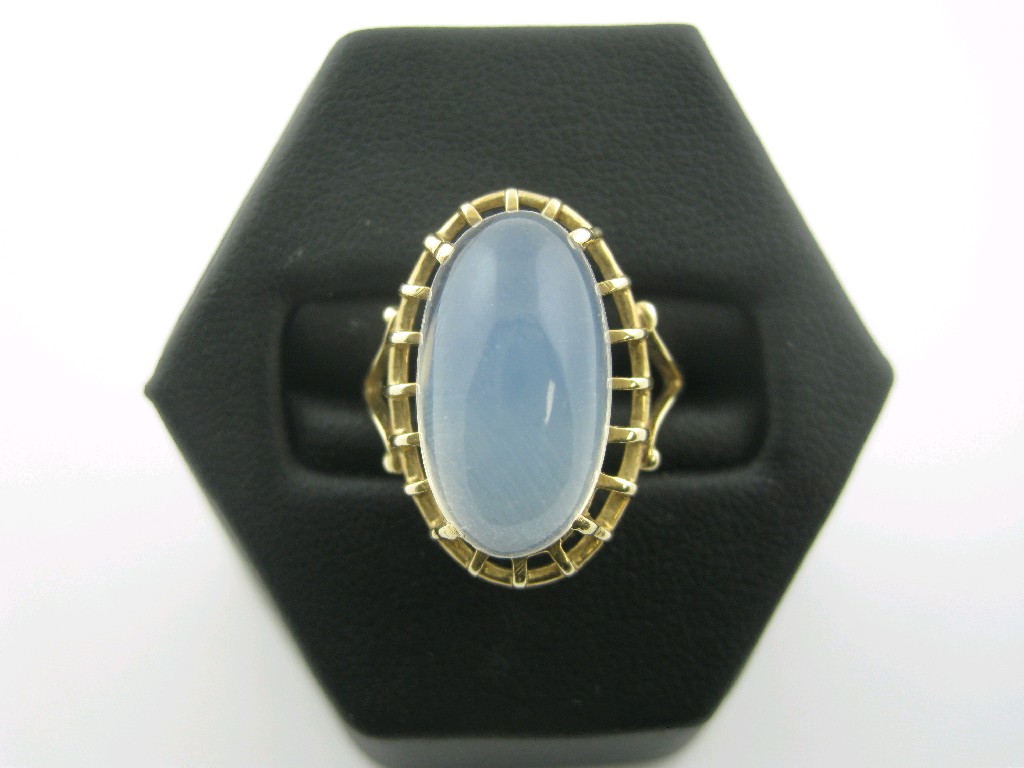 Appraisal: A Moonstone Dress Ring the large oval cabochon x mm