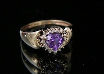 Appraisal: A Feminine Amethyst And Gold Ring A feminine amethyst and