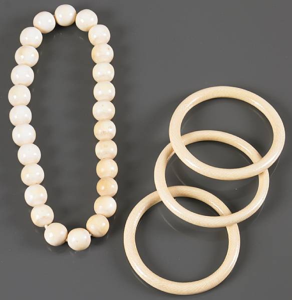 Appraisal: A collection of ivory jewelry featuring four bangles a pair