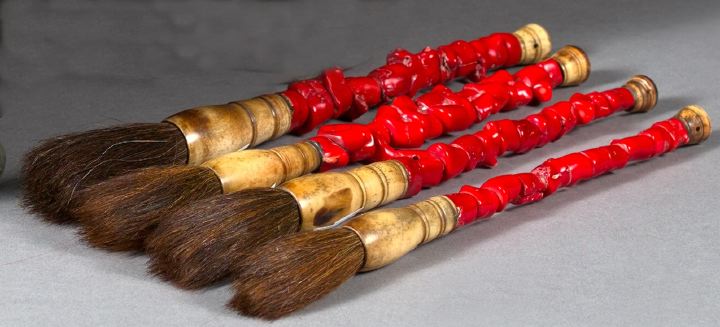 Appraisal: Pair of Chinese Scarlet-Tinted Marble Nugget and Bone Calligrapher's Brushes