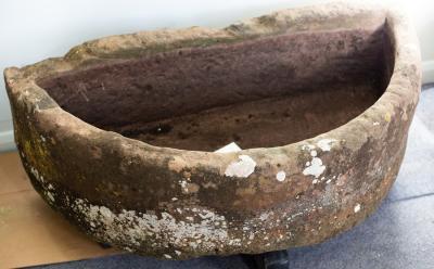 Appraisal: A large D-shaped stone trough cm x cm