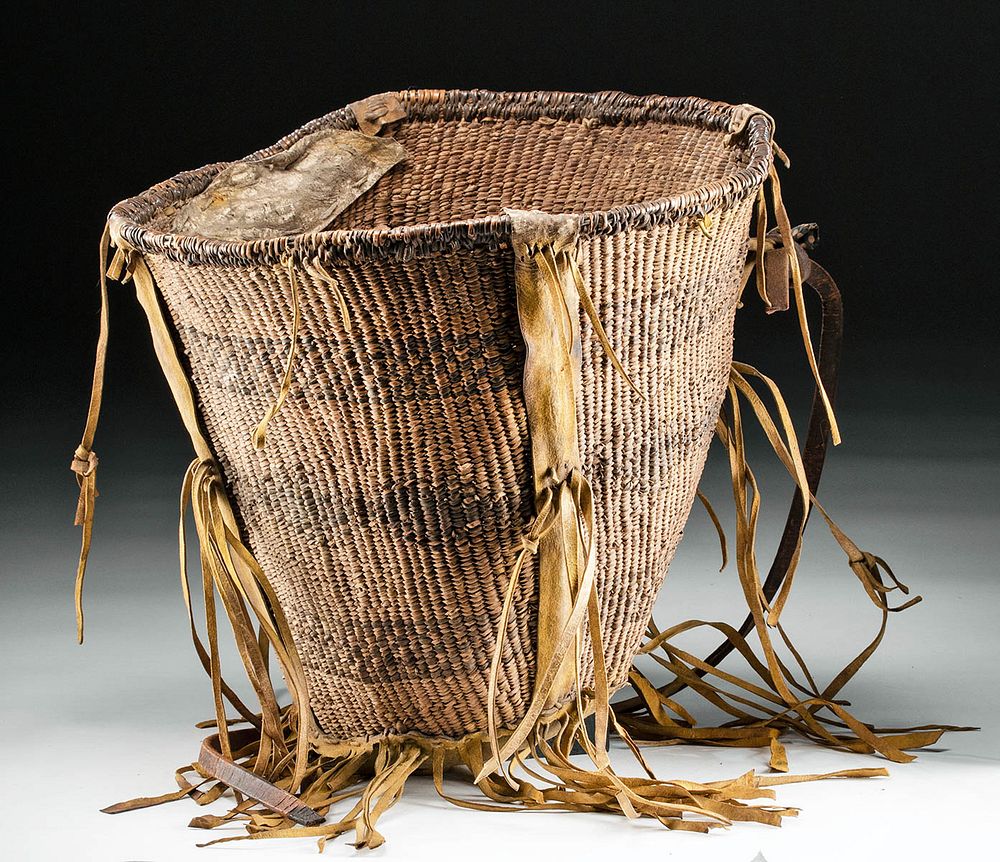 Appraisal: Early th C Apache Woven Basket with Leather Originally Listed