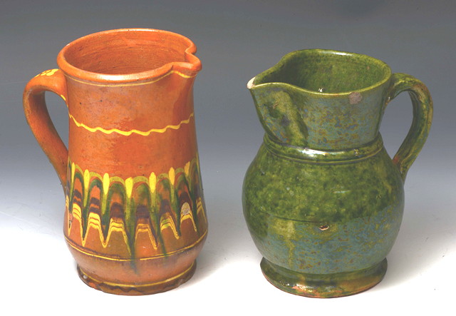 Appraisal: AN OLD CONTINENTAL TERRACOTTA AND GREEN GLAZED JUG with loop