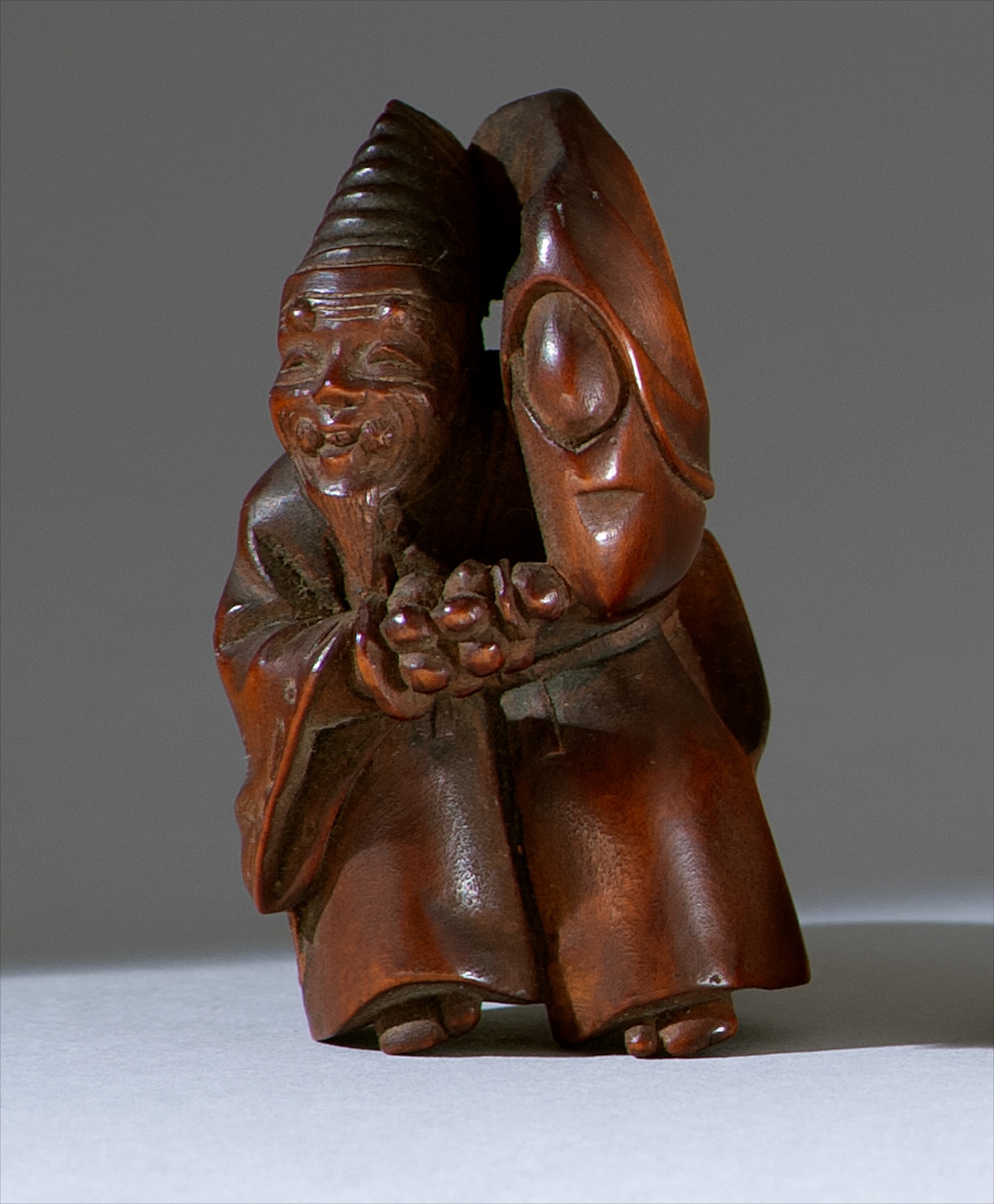 Appraisal: WOOD NETSUKE th CenturyBy Tomomasa Depicting a Sambaso dancer with