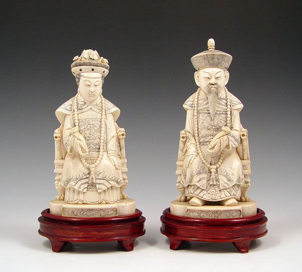 Appraisal: CHINESE CARVED IVORY EMPEROR AND EMPRESS Finely carved rendition of