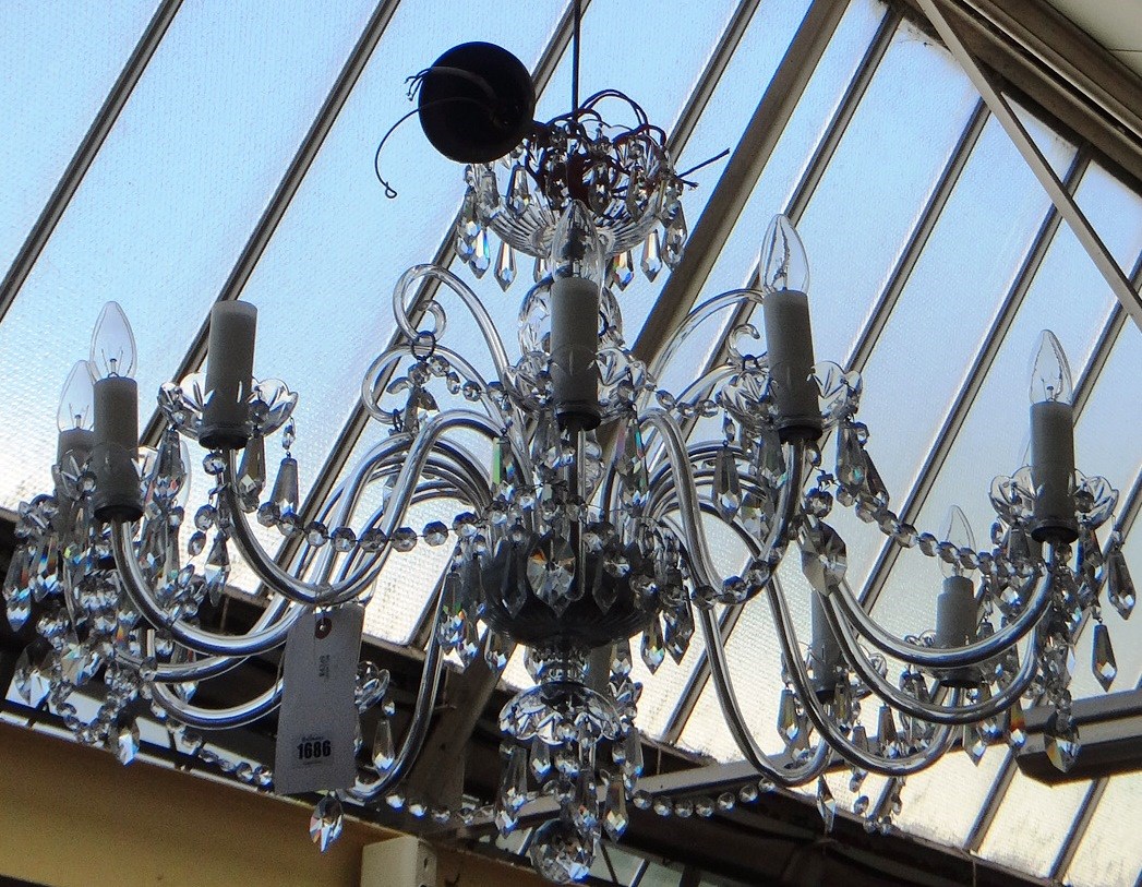 Appraisal: A modern twelve light glass chandelier the cut glass bowl