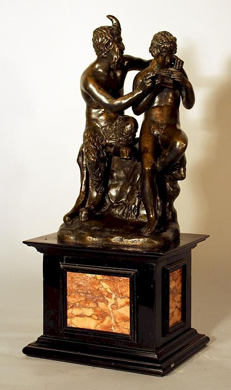 Appraisal: French bronze group A French bronze group of Satyr and