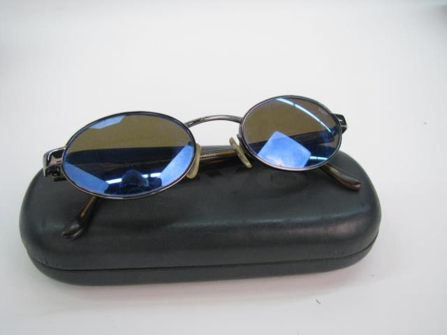 Appraisal: Revo vintage H O sunglasses with tortoise style frame and