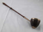 Appraisal: A late th century silver mounted coquilla nut punch ladle