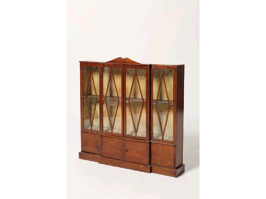 Appraisal: A MINIATURE GEORGE III STYLE BREAKFRONT LIBRARY BOOKCASE with a