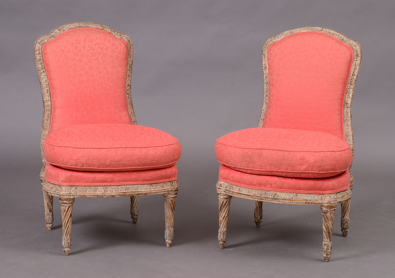 Appraisal: PAIR OF LOUIS XVI STYLE CARVED AND PAINTED CHAISES LA