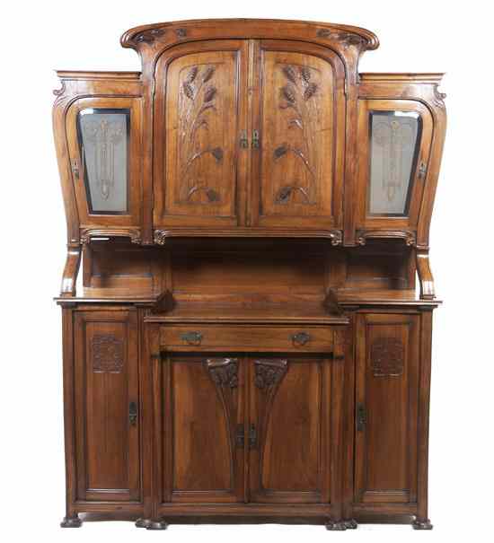 Appraisal: An Art Nouveau Walnut Server in two parts the superstructure