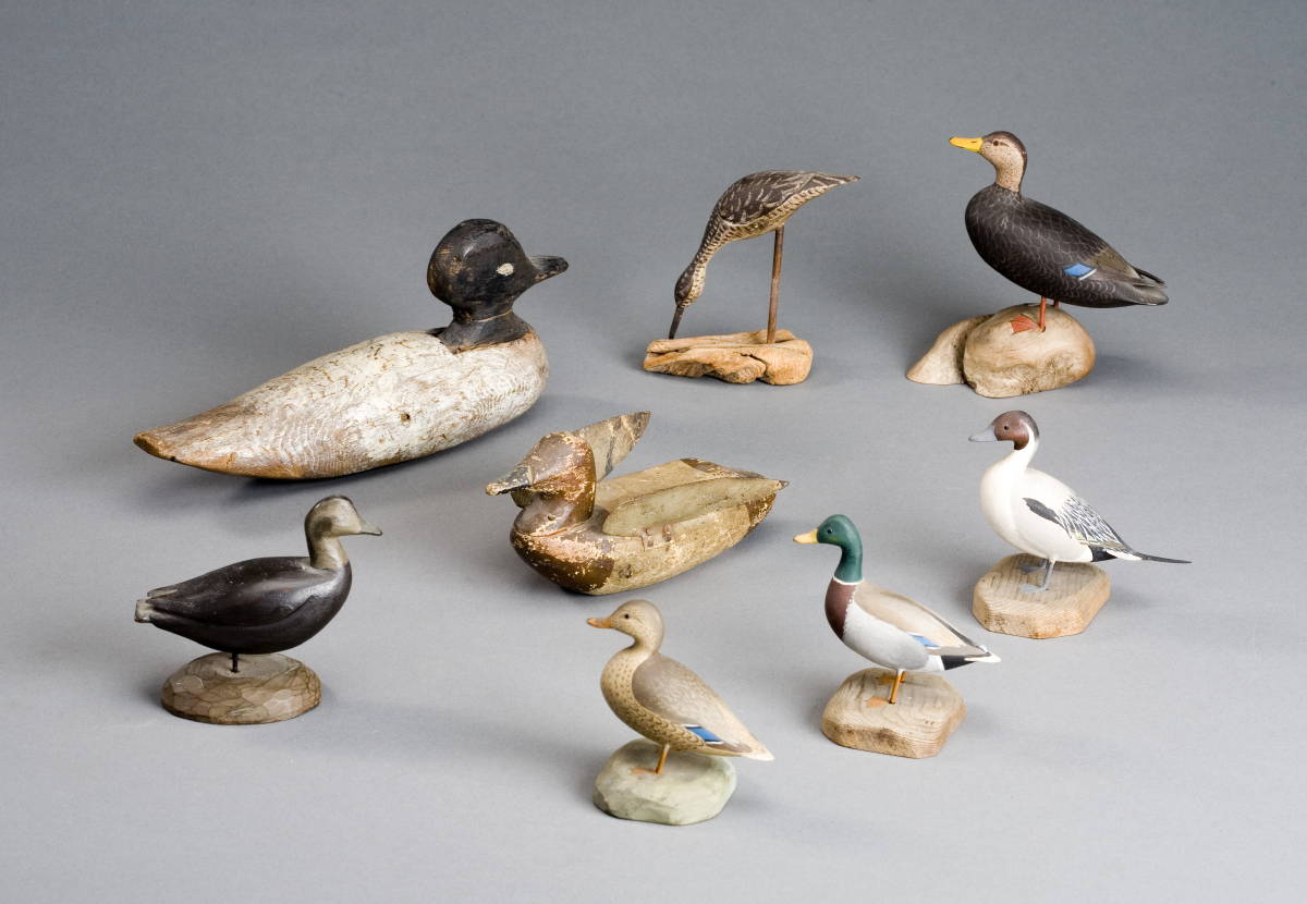 Appraisal: EIGHT CARVED AND PAINTED MINIATURE DUCKS A pair of Mallard