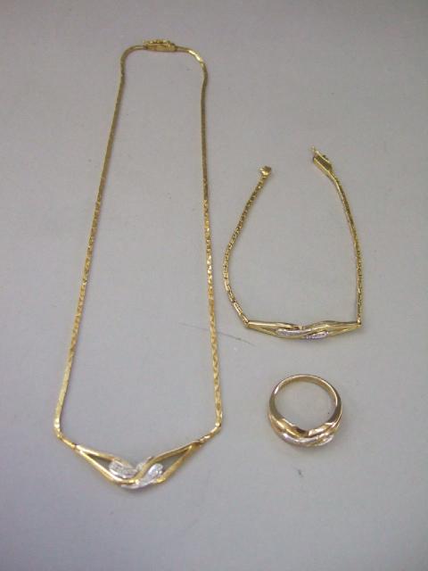 Appraisal: A ct gold and diamond set necklace the front with