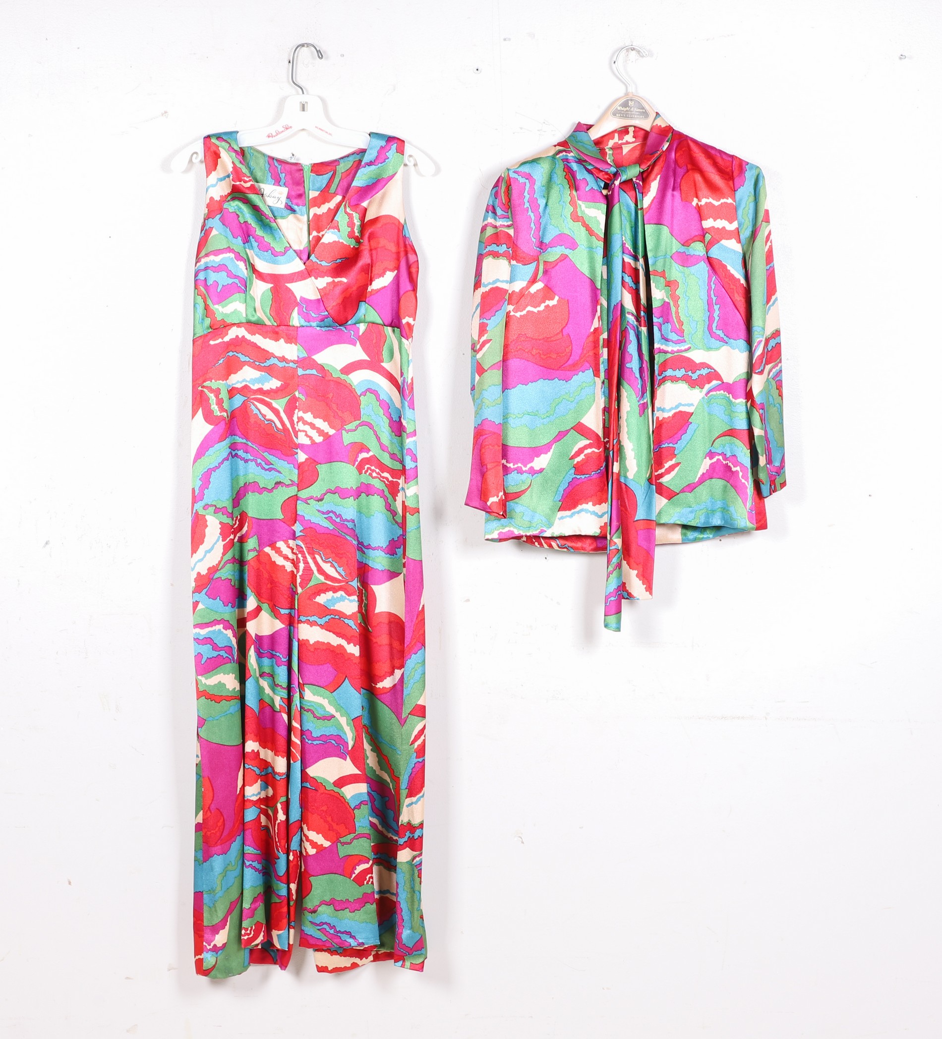 Appraisal: Arkay sateen psychadelic jumpsuit and jacket cross bodice sleeveless jumpsuit