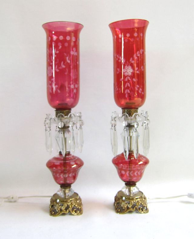 Appraisal: PAIR CRANBERRY GLASS TABLE LAMPS having etched cranberry glass hurricane