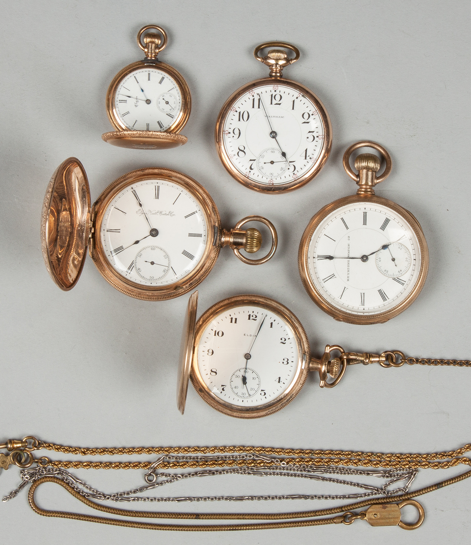 Appraisal: Five Pocket Watches Clockwise from left Elgin Waltham jewel movement