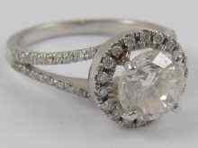 Appraisal: A white metal tests carat gold diamond solitaire ring with