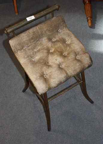 Appraisal: A VICTORIAN GILT BRASS MUSIC CHAIR with button upholstered seat