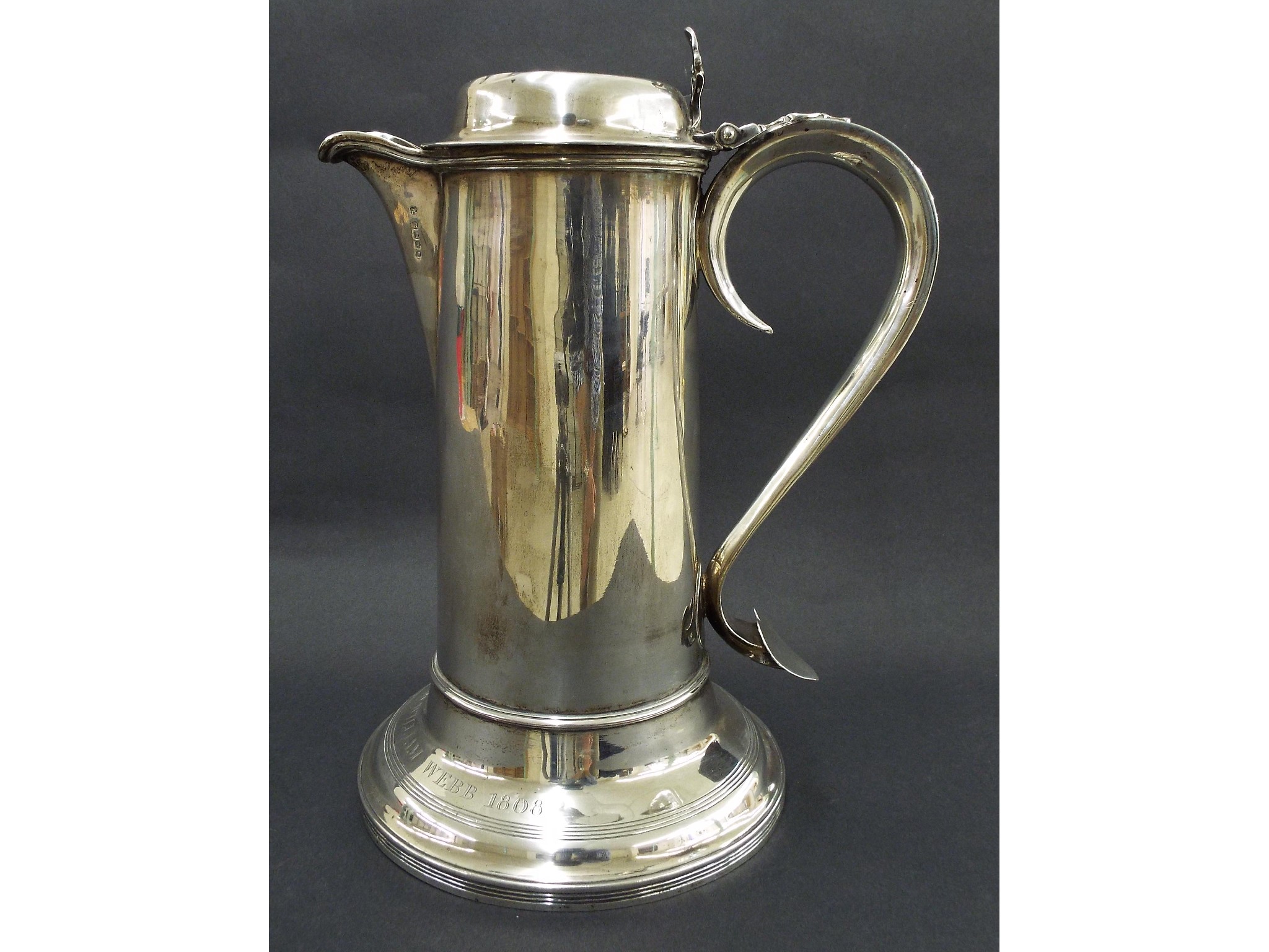 Appraisal: Large George III silver communion jug the S-scroll handle terminating