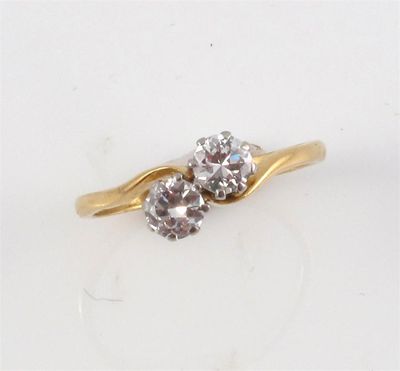 Appraisal: A diamond two stone ring The two circular cut diamonds