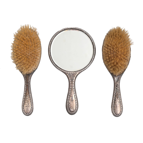 Appraisal: A George V silver brush set hand mirror cm l