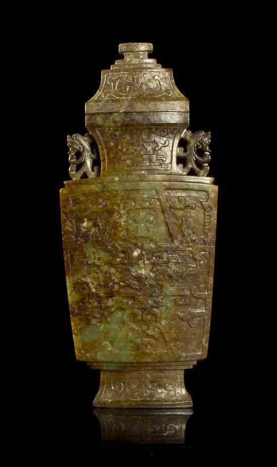 Appraisal: A Chinese Jade Lidded Flask-Form Vase of olive green colored