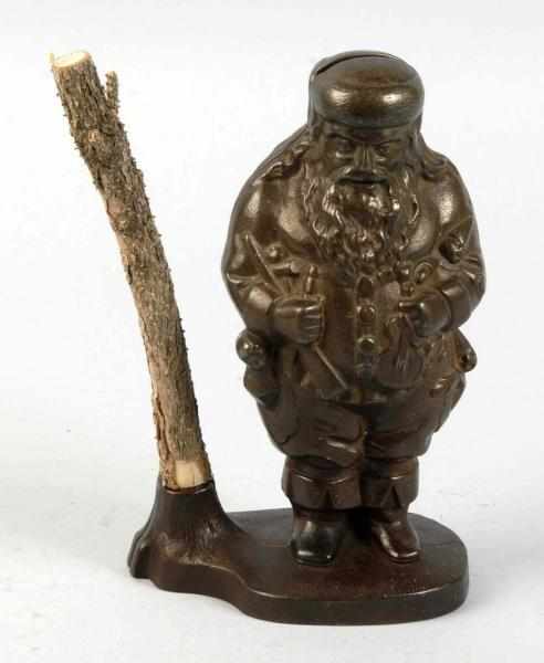 Appraisal: Cast Iron Santa with Tree Still Bank Description Manufactured by